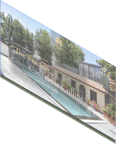 Angled screenshot of a hotel website with a villa and swimming pool